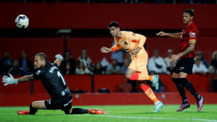 Mallorca sink Atletico, Real Sociedad beat nine-man Sevilla