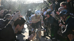 Dominant Pogacar charges to stunning Strade Bianche win