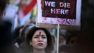 Thousands march in France to back Iranian protesters