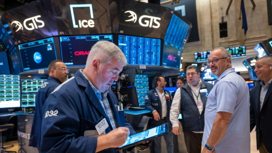 Wall Street en hausse, satisfaite par l'inflation et les r&eacute;sultats des banques