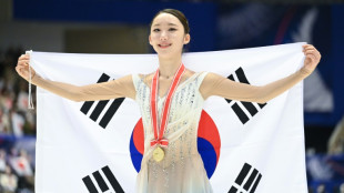 Kim, Uno take top prizes at figure skating's NHK Trophy
