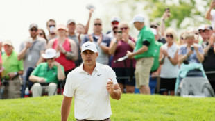 Koepka clings to PGA lead in bid for fifth major, landmark LIV win