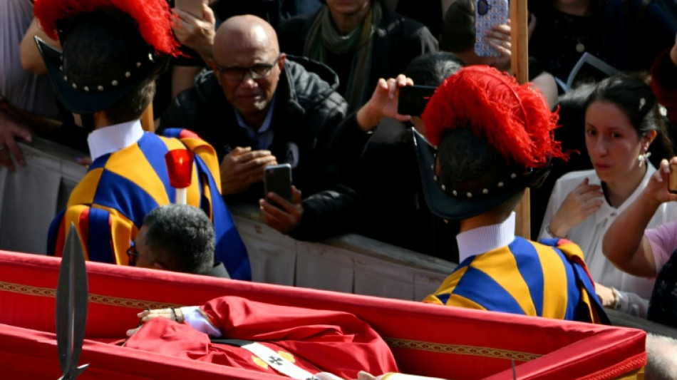 Tens of thousands say goodbye to Pope Francis lying in state