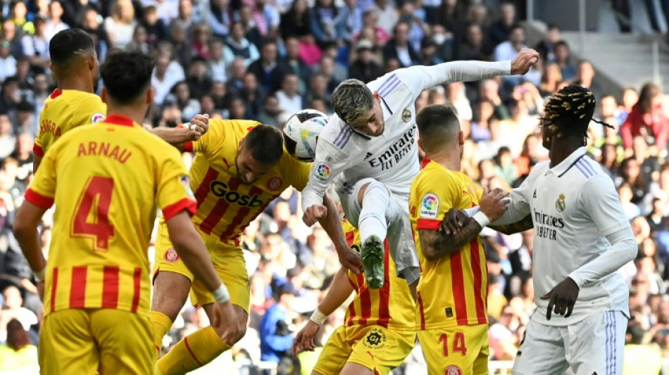 Leaders Madrid drop points at home in Girona draw