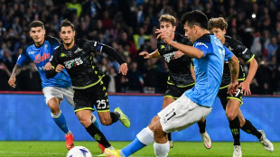 Napoli see off Empoli to go nine points clear