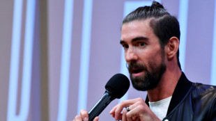 Phelps not ready to move over for 'hungry kid' Marchand