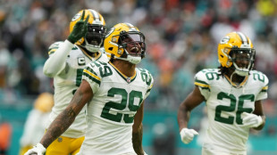 Packers beat Miami to boost NFL playoff hopes while Rams romp