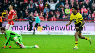 Dortmund, Leipzig win as Champions League race tightens