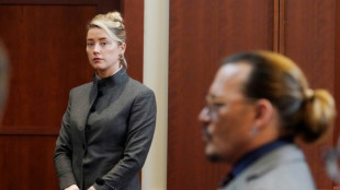 Amber Heard dice haber querido divorciarse de Johnny Depp porque tem&iacute;a por su vida