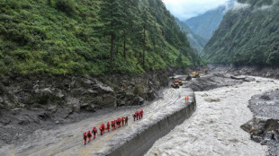 New flood risks impede Nepal, Tibet rescue