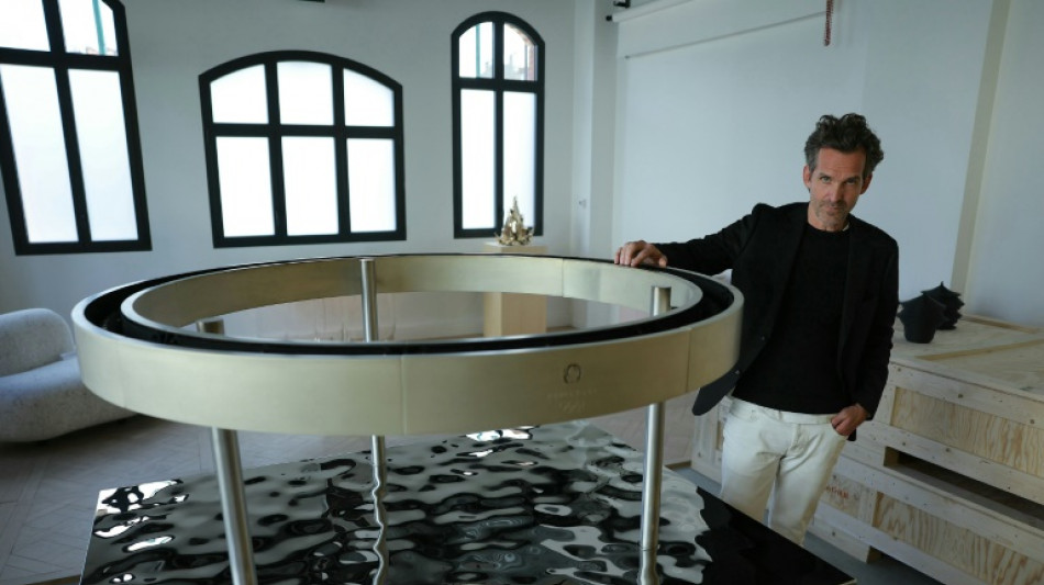 Durante revezamento, chama da tocha ol&iacute;mpica repousar&aacute; em caldeir&otilde;es em formato de anel