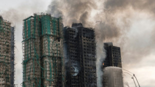 'Dad, there's a fire': survivors recount deadly Hong Kong blaze