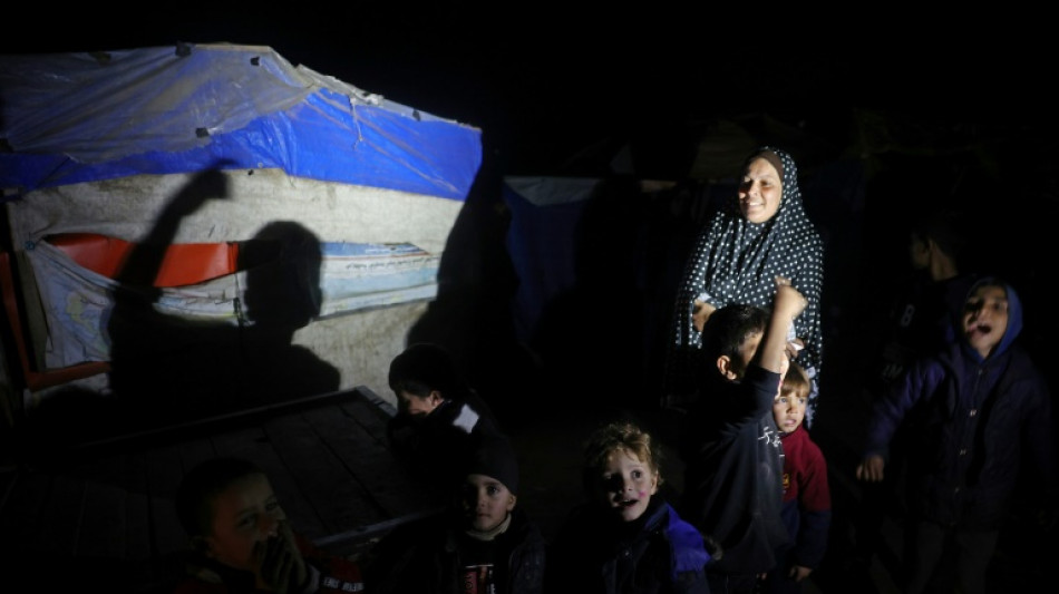 Des milliers de Palestiniens exultent &agrave; travers la bande de Gaza &agrave; l'annonce d'une tr&ecirc;ve