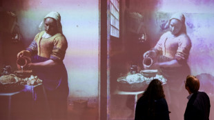 Des objets cach&eacute;s trouv&eacute;s dans le tableau "La Laiti&egrave;re" de Vermeer