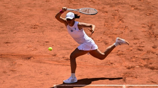 Swiatek fights off Muchova in thriller for third French Open title